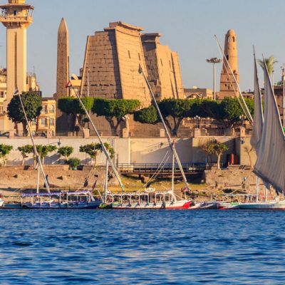 Luxor Temple is a large Ancient Egyptian temple complex on east bank of Nile river in Luxor (ancient Thebes). View from Nile river